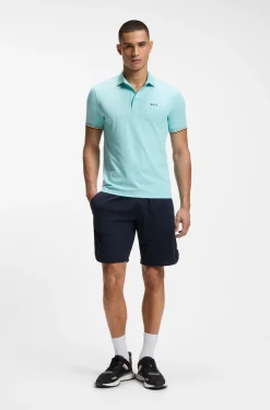 Active Slim-Fit Poloshirt mit geprägtem Tennisball-Muster