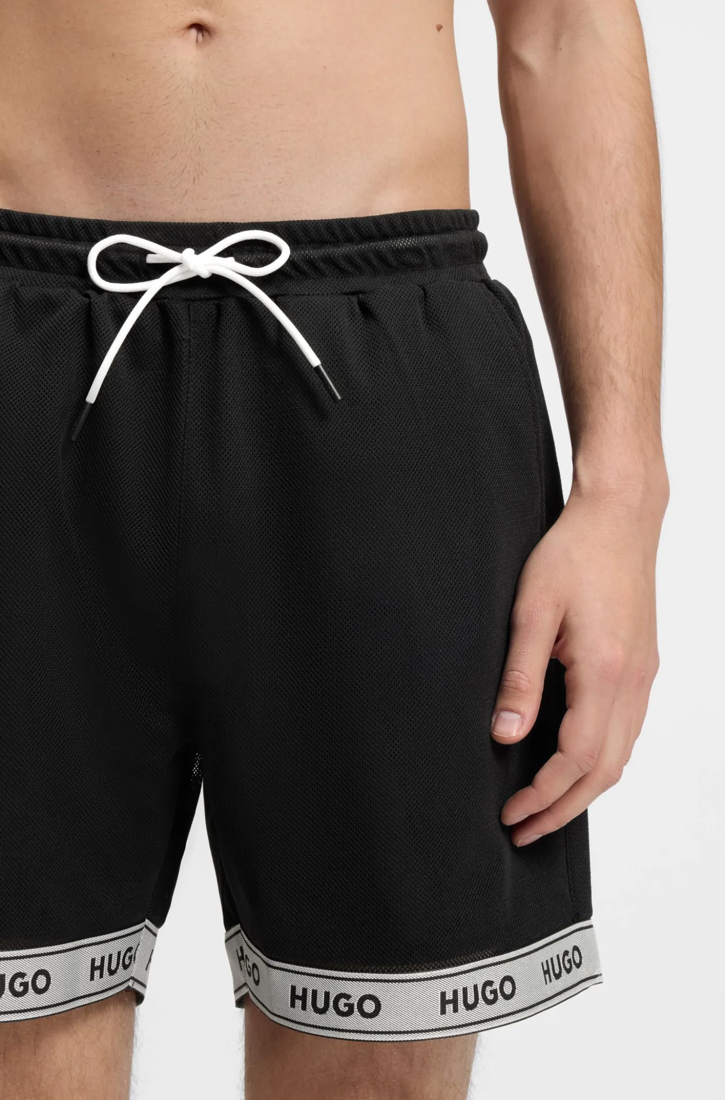 Badeshorts aus Mesh mit Jacquard-Logo-Tape
