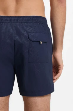 Badeshorts mit Allover-Monogramm-Print