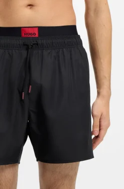 Badeshorts mit doppeltem Bund und Logo-Details