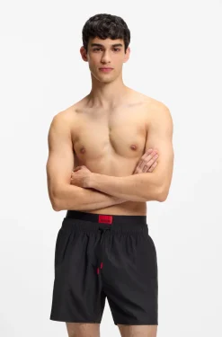 Badeshorts mit doppeltem Bund und Logo-Details