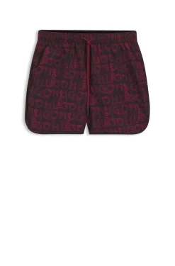 Badeshorts mit saisonalem Print und abgerundetem Saum