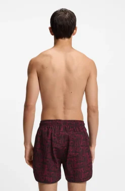 Badeshorts mit saisonalem Print und abgerundetem Saum