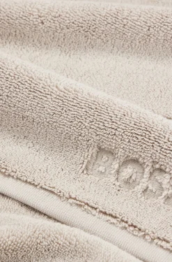 Beige Badematte aus ägäischer Baumwolle mit tonalem Logo