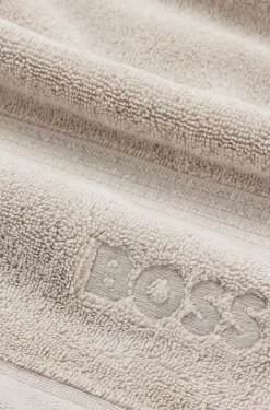Beiges Badetuch aus ägäischer Baumwolle mit tonalem Logo