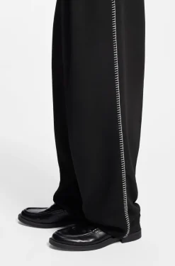 Bundfaltenhose mit Details im Überwendlichstich