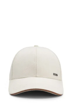 Cap aus Baumwoll-Canvas mit Lederbesatz