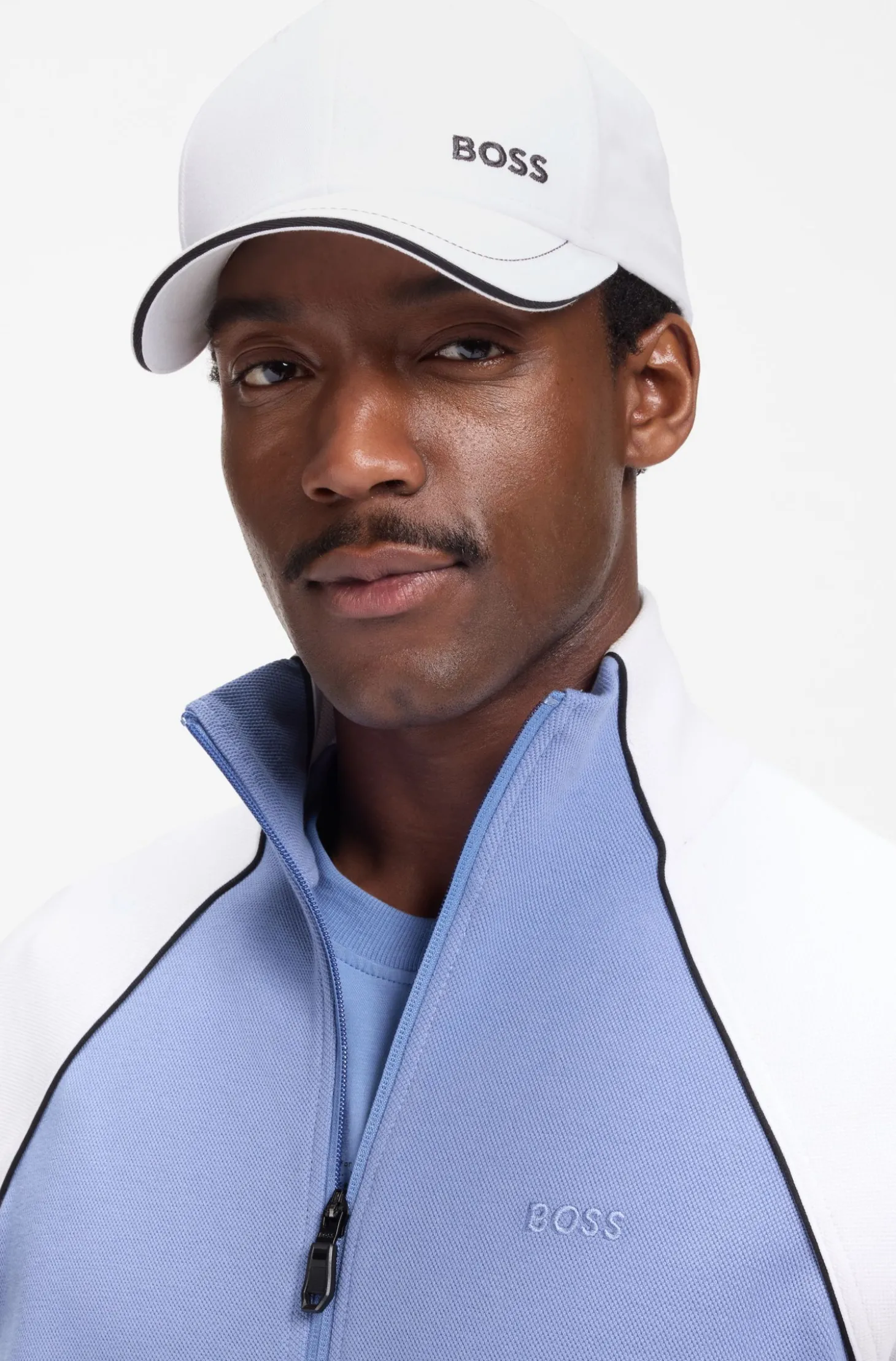 Cap aus Baumwoll-Twill mit Kontrast-Details und Logo-Stickerei