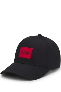 Cap aus Baumwoll-Twill mit rotem Logo-Label