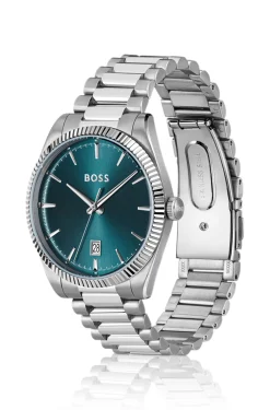 Cheswick Uhr mit blauem Zifferblatt und geriffelter Lünette