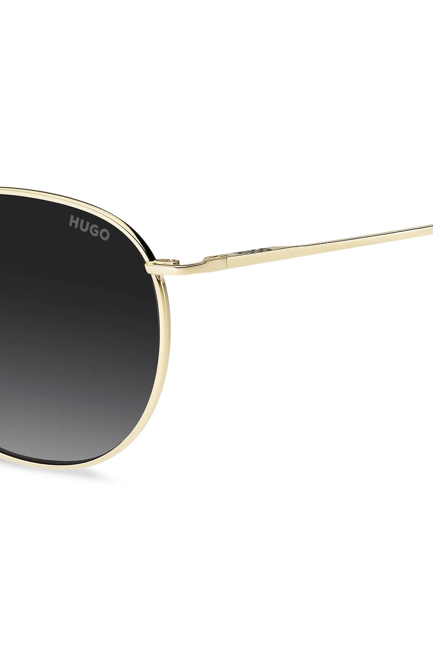 Goldfarbene Sonnenbrille mit Logo-Detail