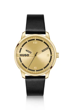 Goldfarbene Uhr mit schwarzem Lederarmband