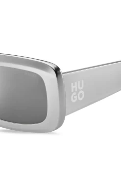 Graue Sonnenbrille mit Stack-Logo an den Bügeln