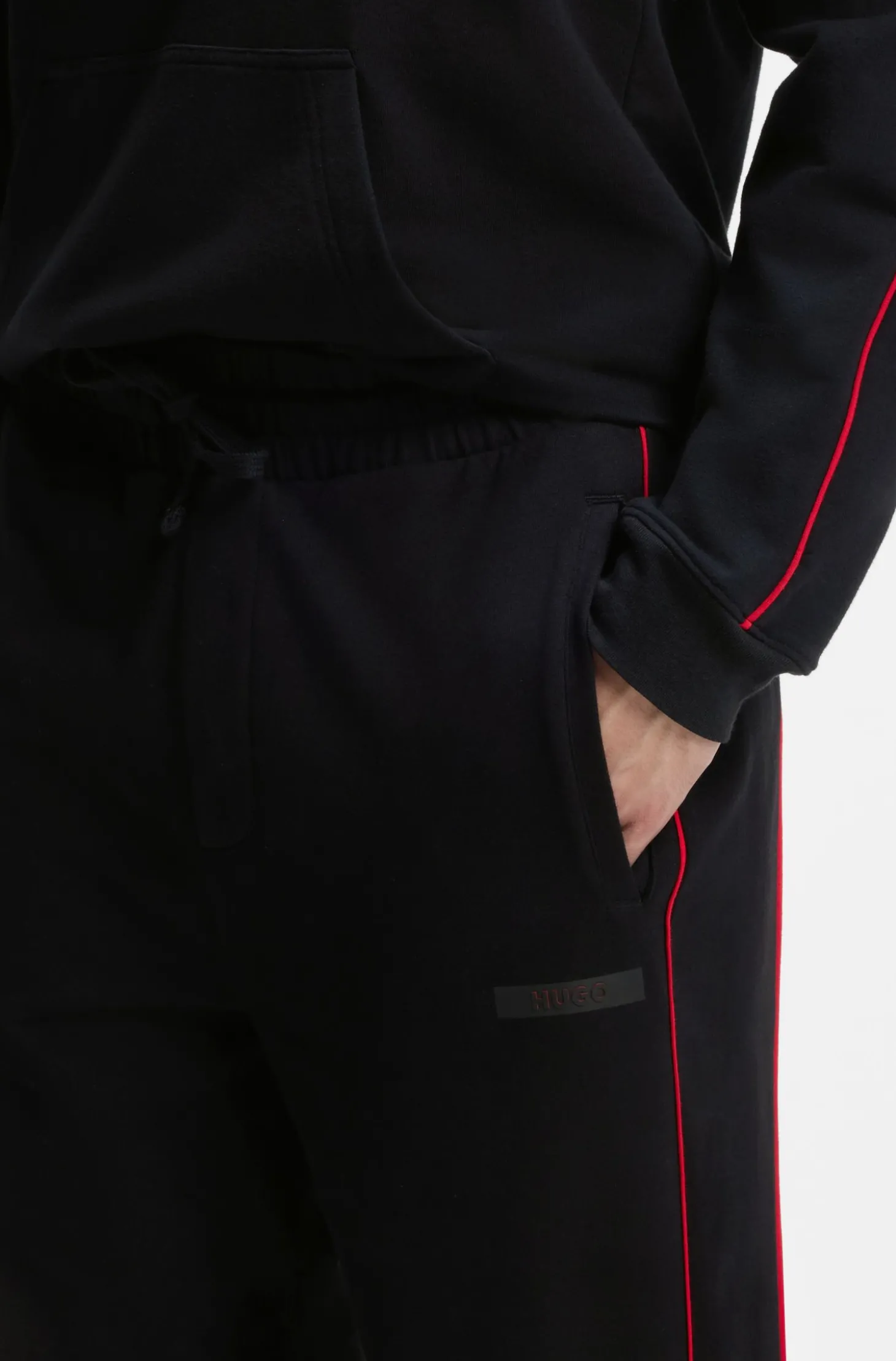 Jogginghose aus Baumwolle mit Elasthan-Anteil mit kontrastfarbenen Paspeln