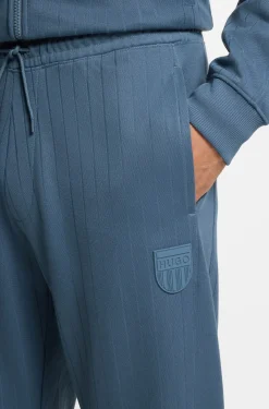 Jogginghose aus Baumwoll-Mix mit Drop-Needle-Streifen