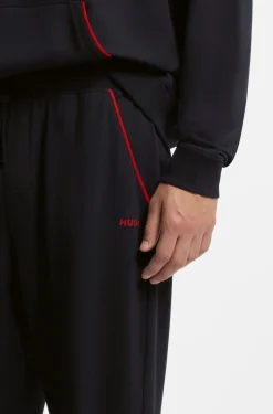 Jogginghose aus Baumwoll-Mix mit Bündchen und Logo-Paspeln