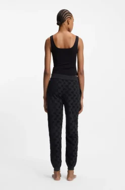 Jogginghose aus Baumwoll-Mix mit Allover-Logo-Muster