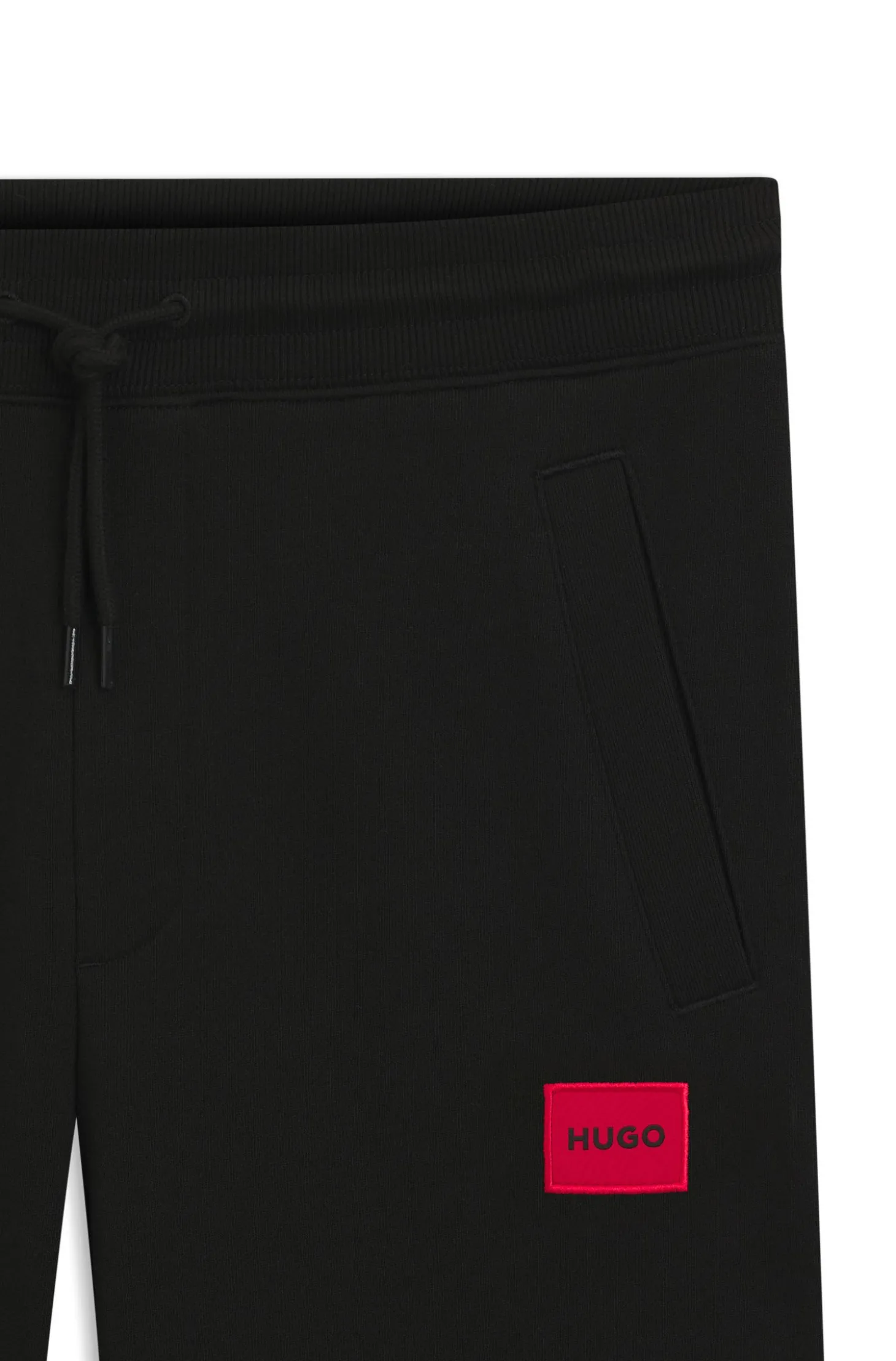 Jogginghose aus Baumwoll-Terry mit rotem Logo-Label