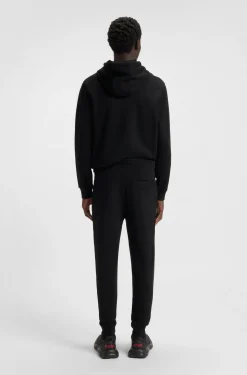 Jogginghose aus Baumwoll-Terry mit rotem Logo-Label