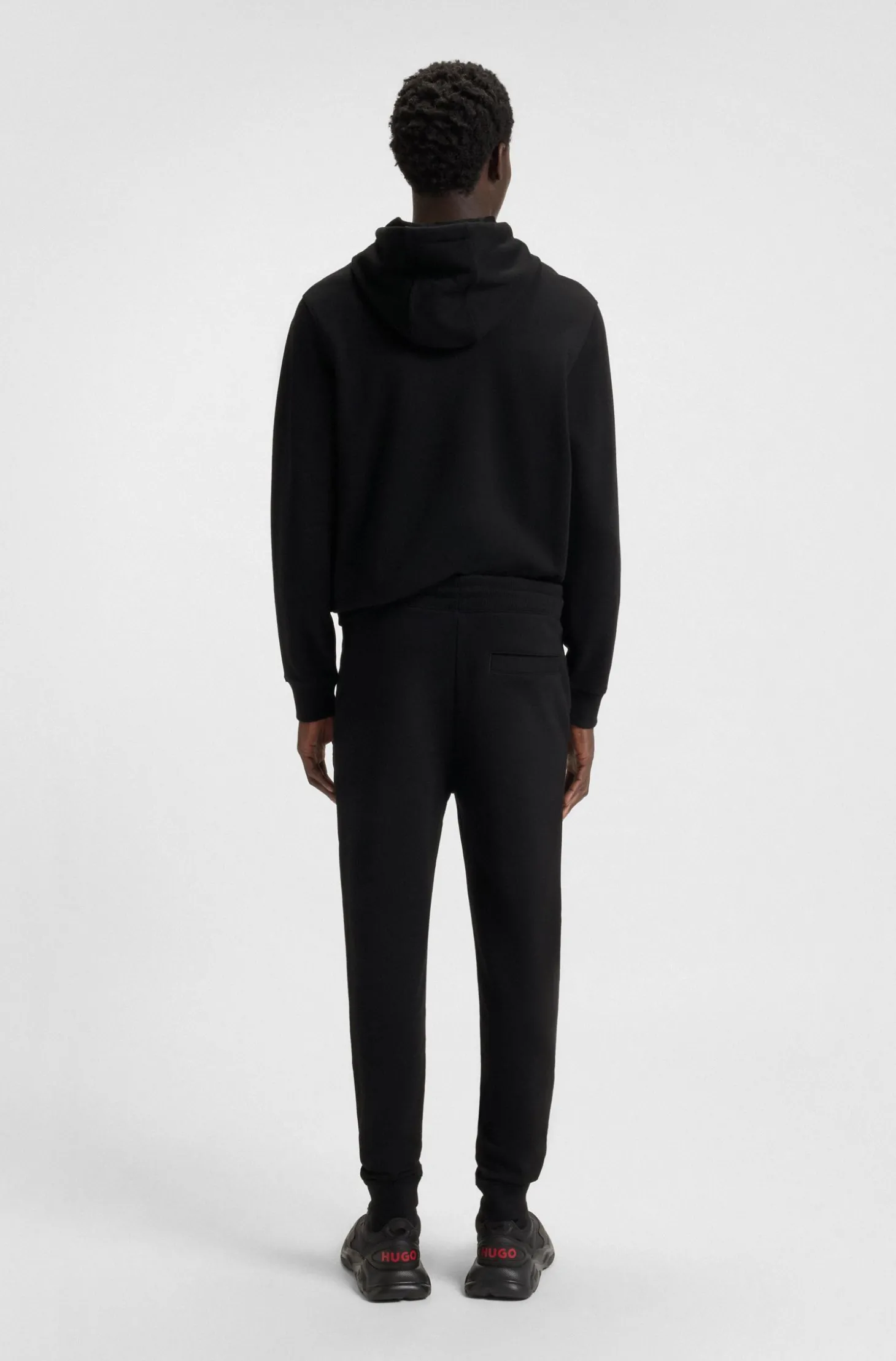 Jogginghose aus Baumwoll-Terry mit rotem Logo-Label