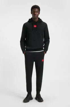 Jogginghose aus Baumwoll-Terry mit rotem Logo-Label
