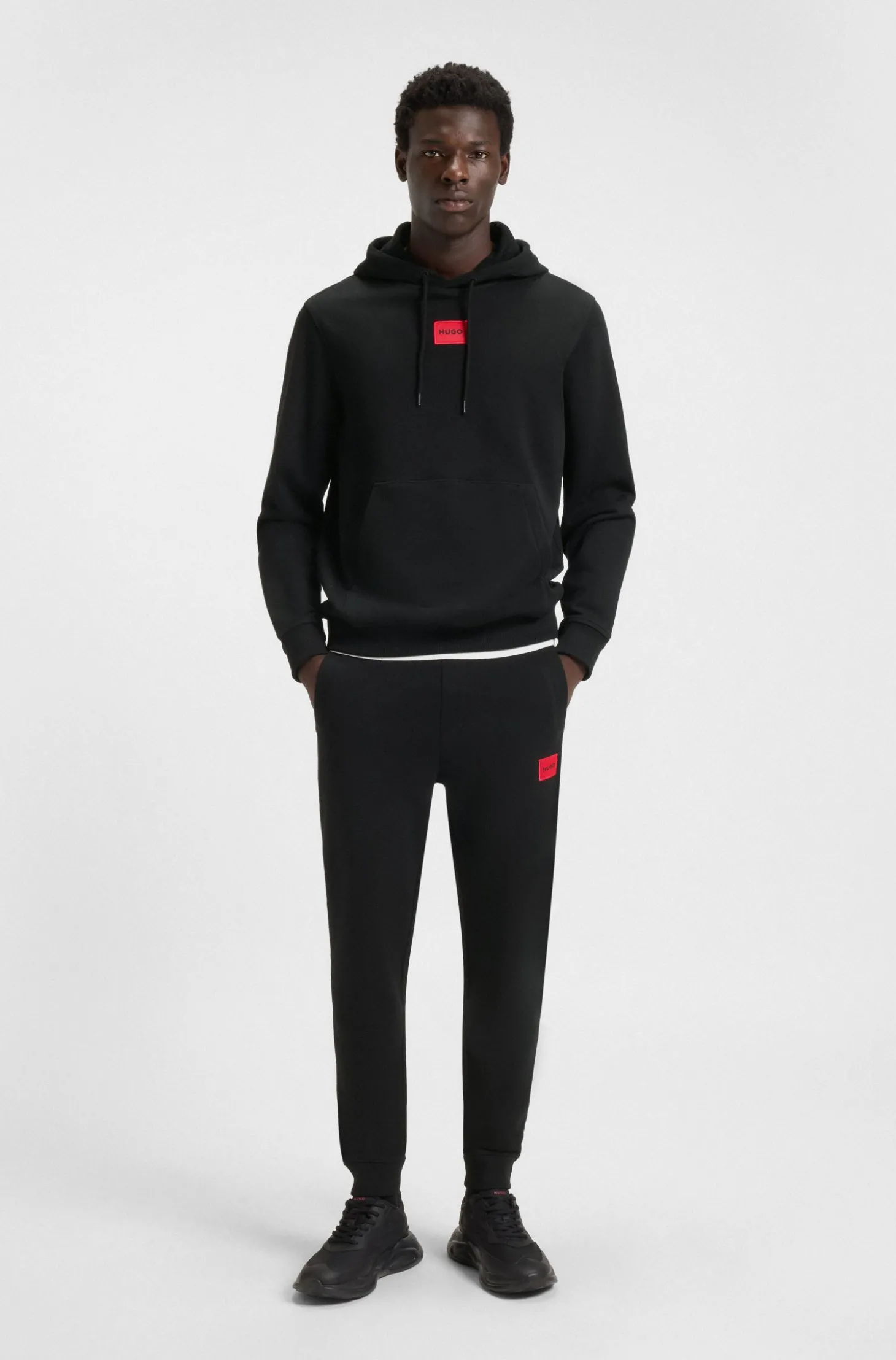 Jogginghose aus Baumwoll-Terry mit rotem Logo-Label