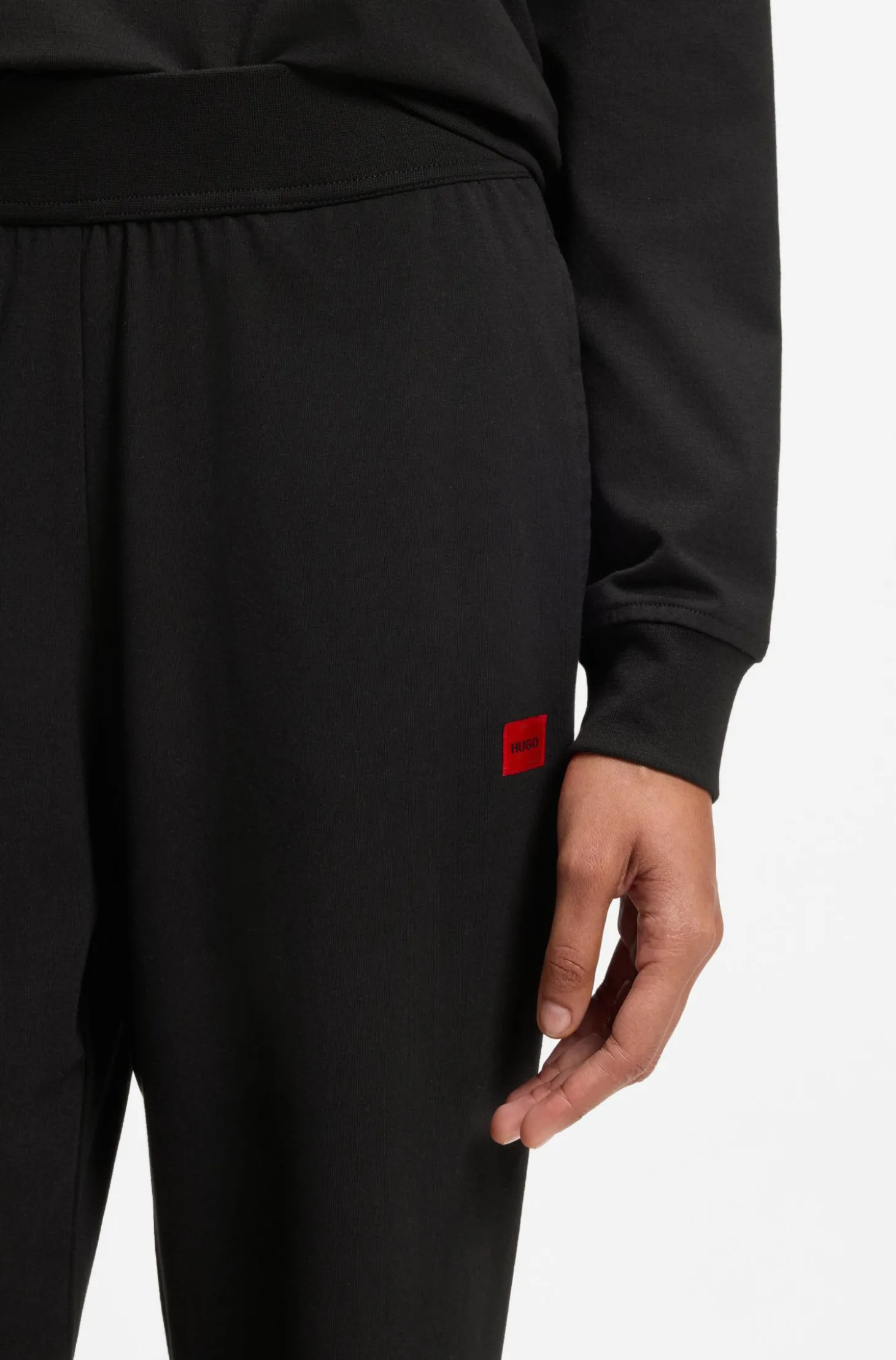 Jogginghose aus Stretch-Jersey mit rotem Logo-Label