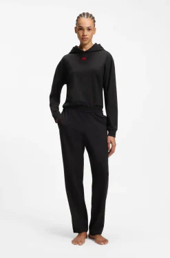 Jogginghose aus Stretch-Jersey mit rotem Logo-Label