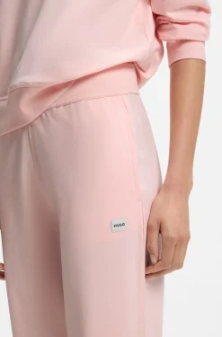 Jogginghose aus Stretch-Jersey mit rotem Logo-Label