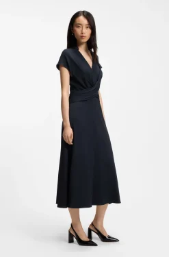 Kleid aus Stretch-Gewebe in Wickeloptik