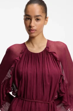 Kleid mit Gürtel und Trichterärmeln