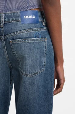 Loose-Fit Jeans aus blauem Denim mit ausgefransten Säumen