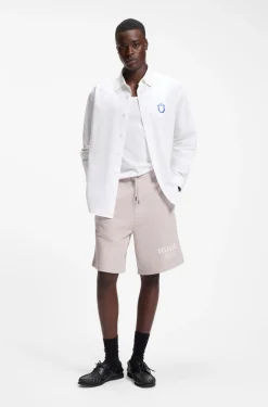 Loose-Fit Shorts aus Baumwoll-Terry mit Logo-Print