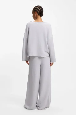 Loose-Fit Sweatshirt aus Baumwoll-Mix mit unversäuberten Säumen