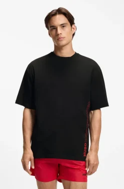 Oversized-Fit T-Shirt aus Baumwolle mit fortlaufendem Logo-Print
