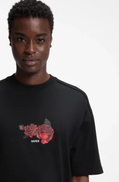 Oversized T-Shirt aus Baumwolle mit Rosen-Grafik im Biker-Stil