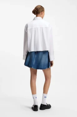 Oversize-Hemd aus Baumwolle mit Nadelstreifen und offen geschnittenem Saum