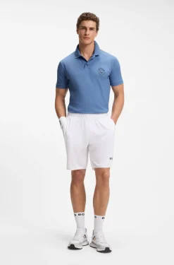 Poloshirt aus Stretch-Baumwolle mit tennisinspiriertem Logo