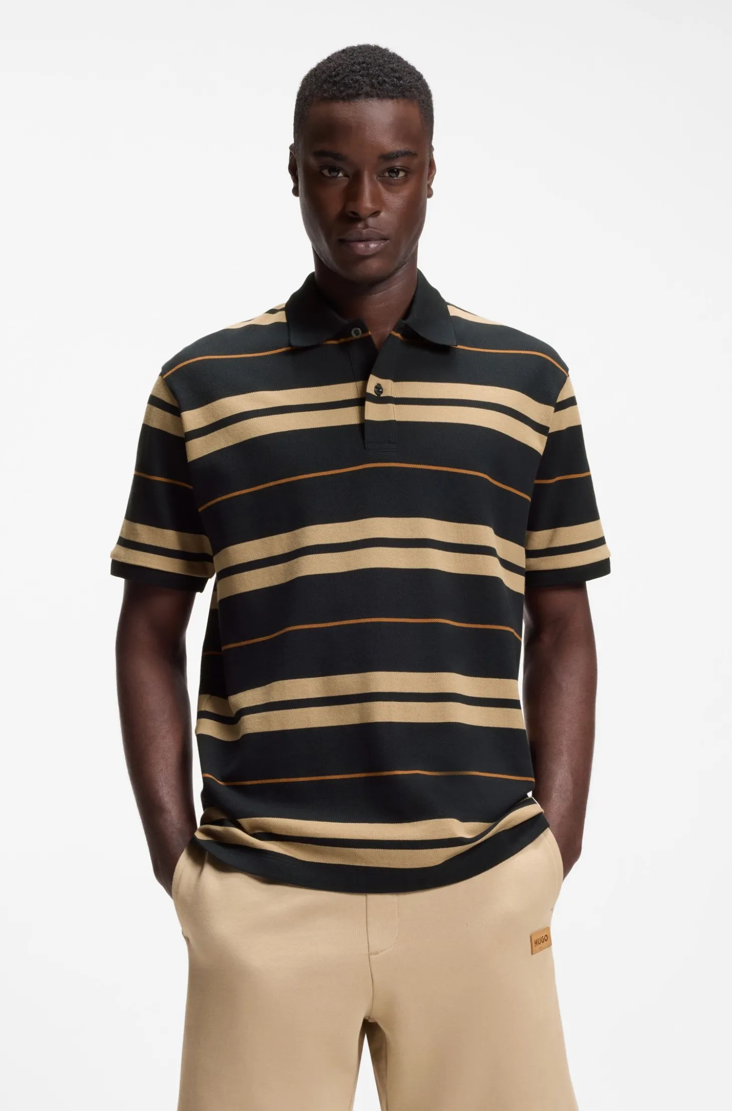 Regular-Fit Poloshirt aus Baumwoll-Piqué mit eingearbeiteten Streifen