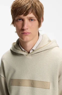 Relaxed-Fit Hoodie aus Baumwollfrottee mit weit gesetztem Logo