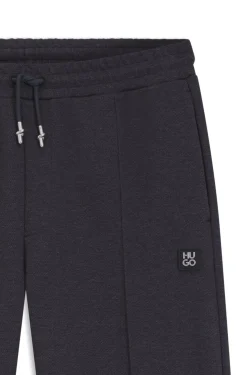 Relaxed geschnittene Jogginghose mit Biesenfalten