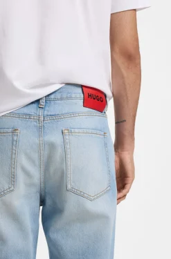 Relaxed Tapered-Fit Jeans aus hellblauem Denim