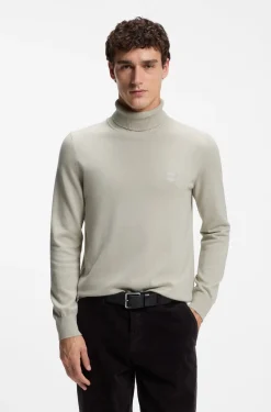 Rollkragenpullover aus Baumwoll-Mix mit Kaschmir und Logo-Aufnäher