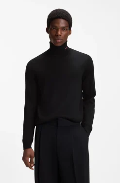 Rollkragenpullover aus Merinowolle mit Logo-Stickerei