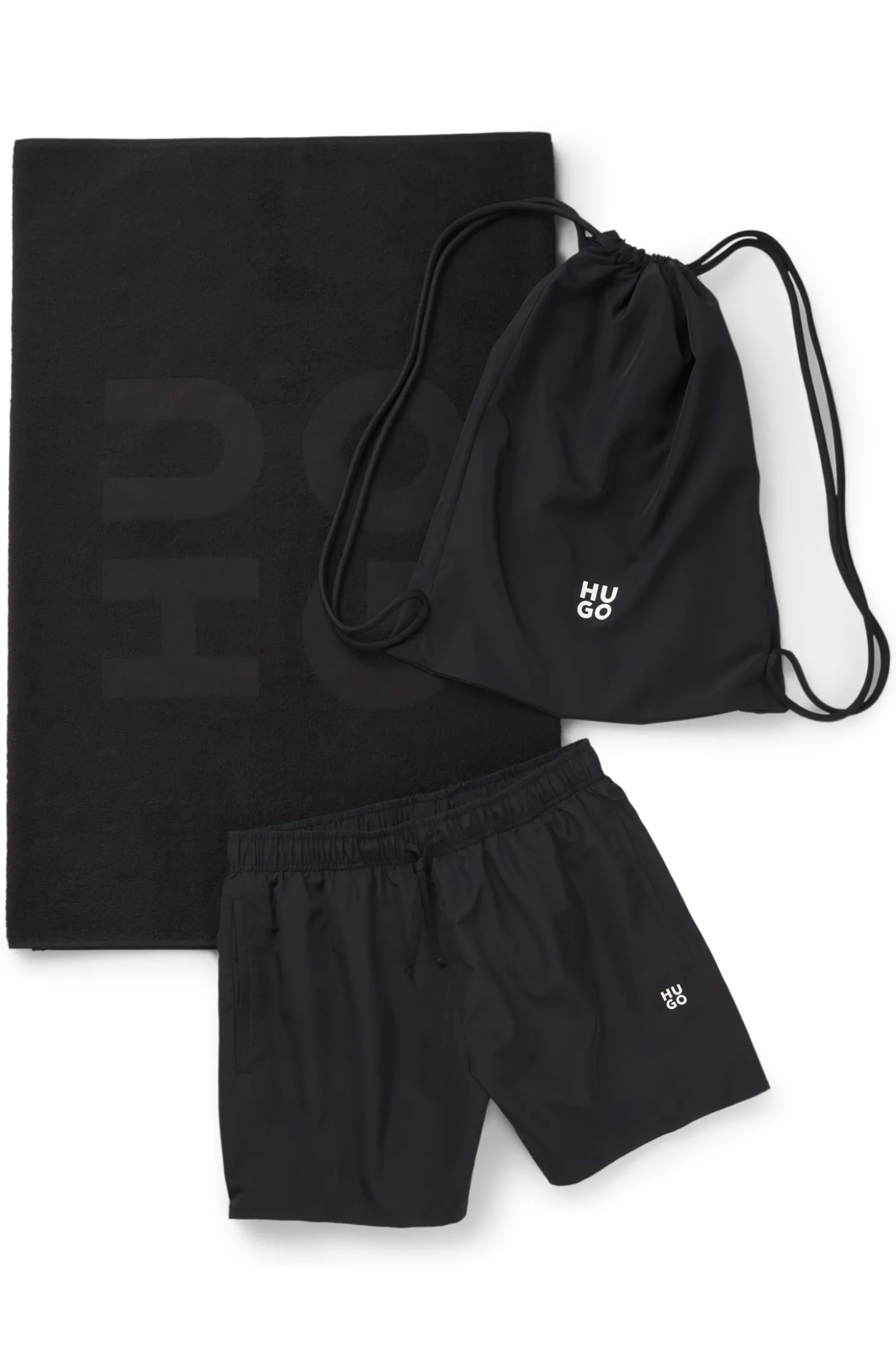 Set mit Badeshorts, Badetuch und Tasche