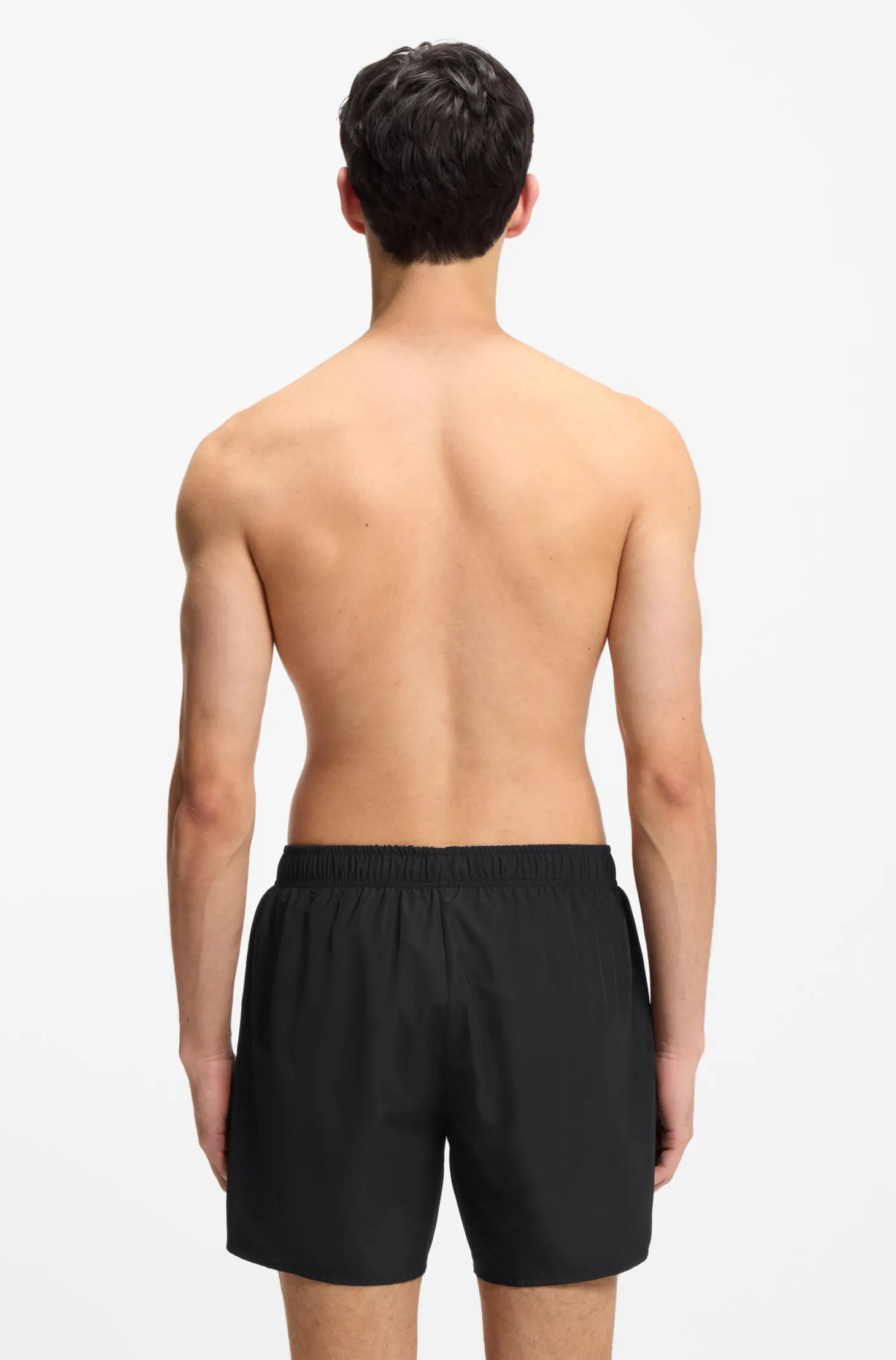 Set mit Badeshorts, Badetuch und Tasche