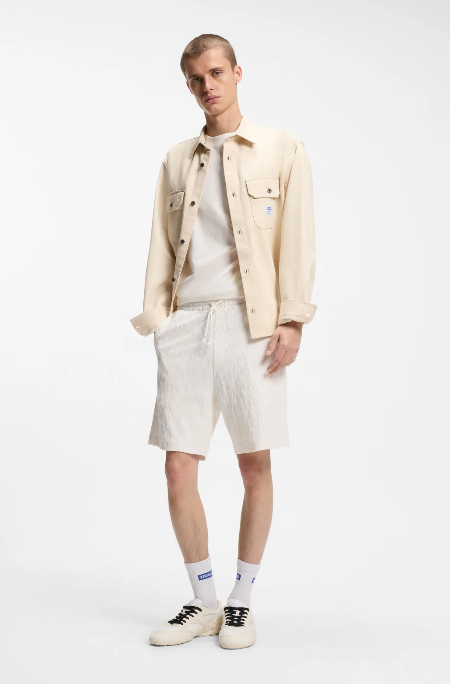 Shorts aus Baumwoll-Frottee mit Leopard-Jacquard