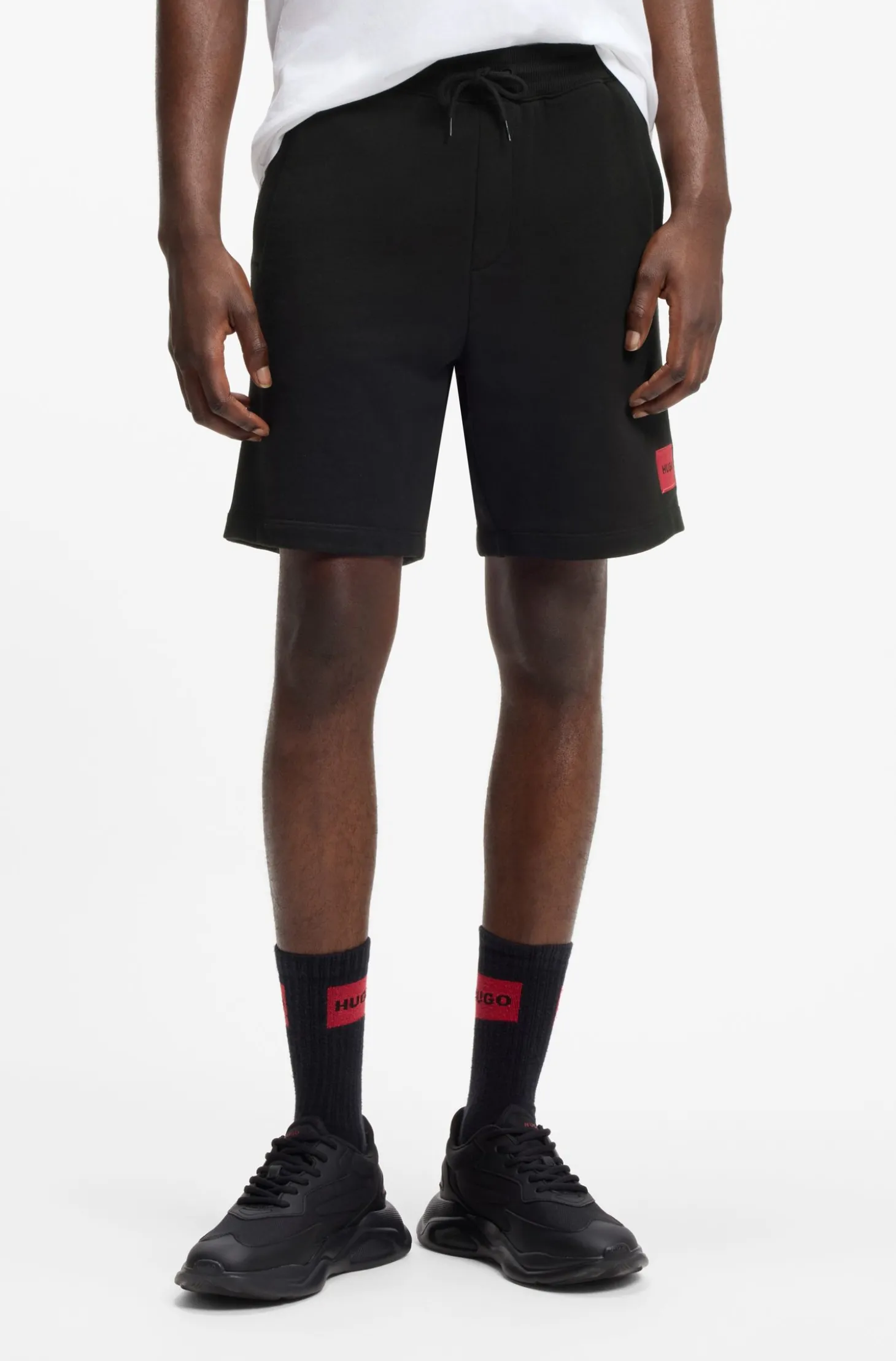 Shorts aus Baumwoll-Terry mit rotem Logo-Label