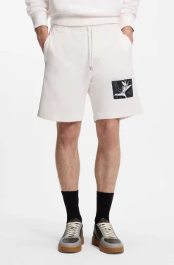 Shorts aus Baumwoll-Terry mit Artwork-Patch
