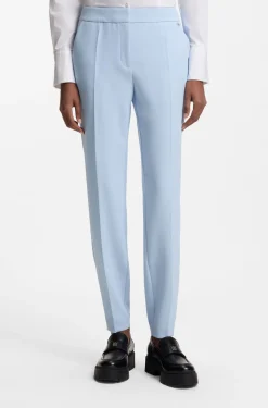 Slim-Fit Hose aus Stretch-Gewebe mit Logo-Niete
